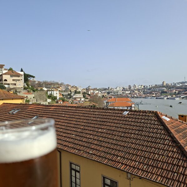 A well-deserved glass of beer with Porto in the background