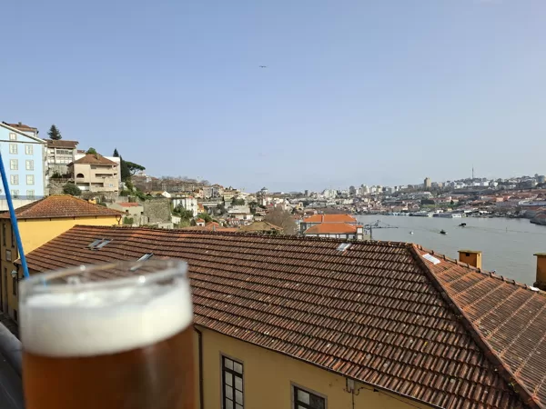 A well-deserved glass of beer with Porto in the background